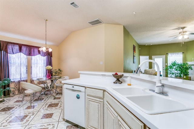 kitchen featuring a sink, visible vents, dishwasher, and light tile patterned floors