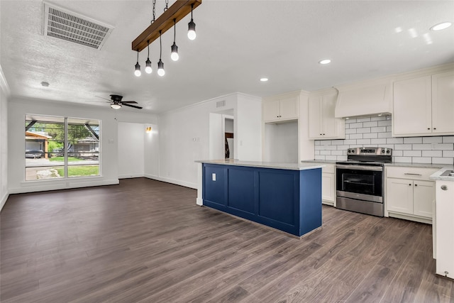 4343 Birch Dr, Mesquite, TX 75150 - kitchen with stainless steel electric stove, custom exhaust hood, open floor plan, dark wood finished floors, and light countertops