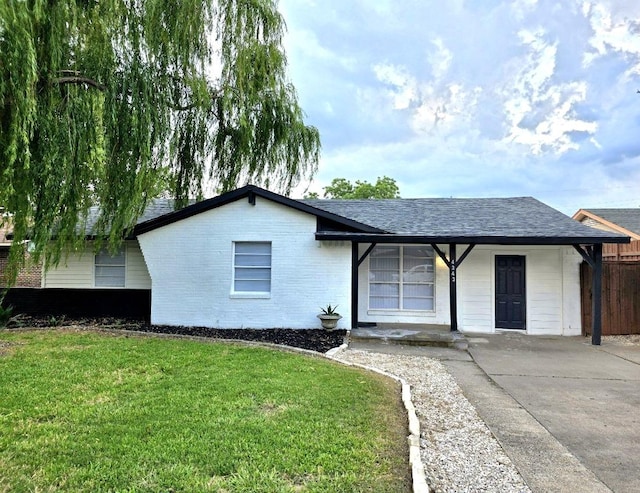 4343 Birch Dr, Mesquite, TX 75150 - single story home with a front lawn, a shingled roof, a porch, brick siding, and concrete driveway