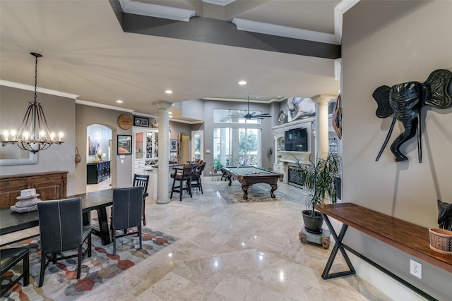 interior space with marble finish floor, ceiling fan with notable chandelier, decorative columns, and billiards