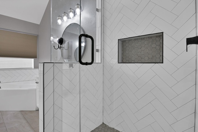 9409 Stonewood Dr, Mckinney, TX 75072 - bathroom featuring tiled shower, a garden tub, and tile patterned floors