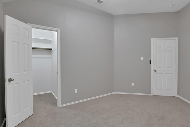 9409 Stonewood Dr, Mckinney, TX 75072 - unfurnished bedroom with carpet floors, a walk in closet, baseboards, and a closet