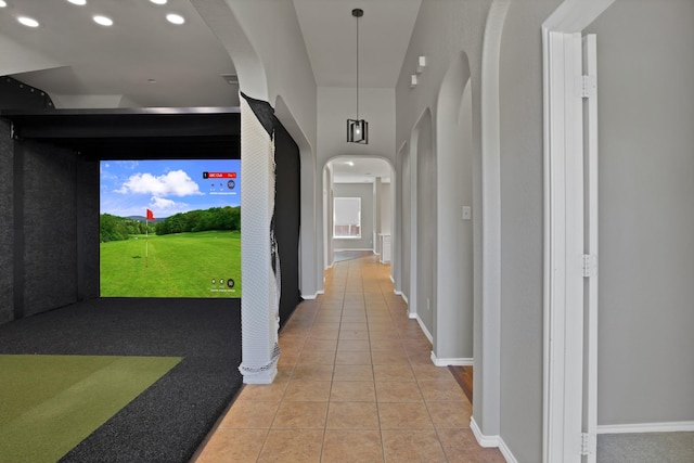 9409 Stonewood Dr, Mckinney, TX 75072 - hall featuring light tile patterned floors, arched walkways, recessed lighting, and baseboards