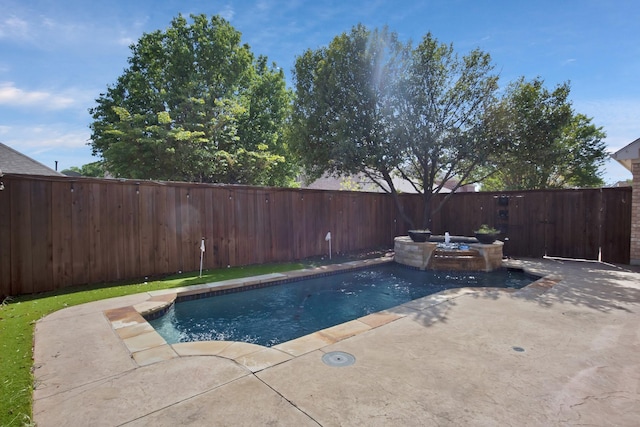 9409 Stonewood Dr, Mckinney, TX 75072 - view of swimming pool with a patio area and a fenced backyard