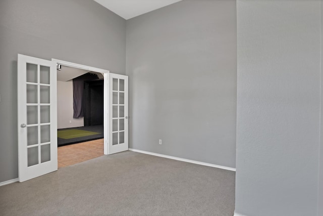 9409 Stonewood Dr, Mckinney, TX 75072 - carpeted empty room featuring french doors and baseboards