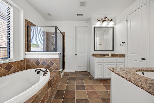 4504 Oxbow Dr, Mckinney, TX 75072 - full bath with a shower stall, vanity, and a bath