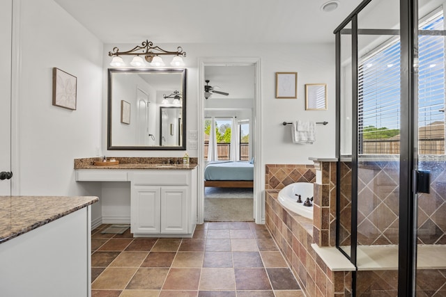 4504 Oxbow Dr, Mckinney, TX 75072 - ensuite bathroom with a ceiling fan, a bath, and vanity