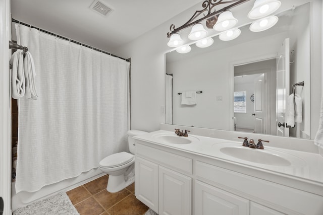 4504 Oxbow Dr, Mckinney, TX 75072 - full bathroom with toilet, double vanity, shower / bath combination with curtain, and tile patterned flooring