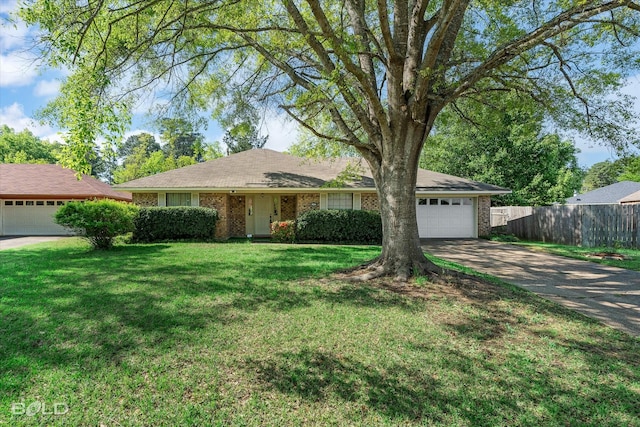 6307 Bocage Dr, Shreveport, LA 71119 - single story home with a front yard, a garage, fence, concrete driveway, and brick siding