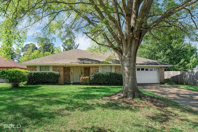 6307 Bocage Dr, Shreveport, LA 71119 - ranch-style home featuring an attached garage, fence, brick siding, a front lawn, and driveway