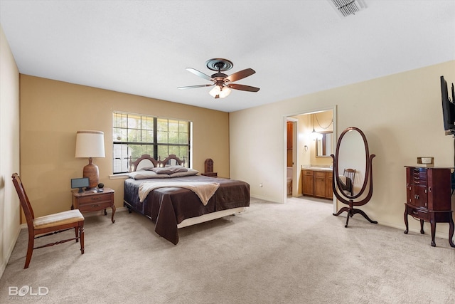 6307 Bocage Dr, Shreveport, LA 71119 - bedroom featuring visible vents, baseboards, ensuite bathroom, ceiling fan, and light carpet