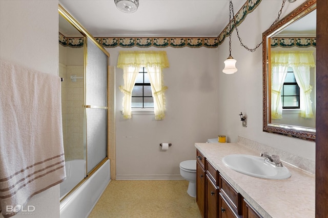 6307 Bocage Dr, Shreveport, LA 71119 - bathroom with toilet, enclosed tub / shower combo, vanity, and ornamental molding