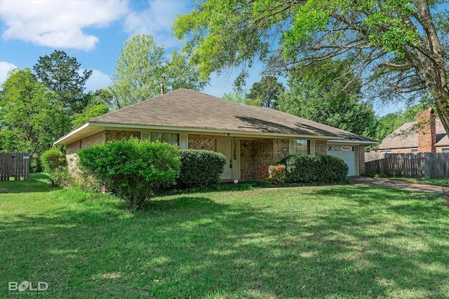 6307 Bocage Dr, Shreveport, LA 71119 - single story home featuring a front yard, brick siding, fence, and an attached garage