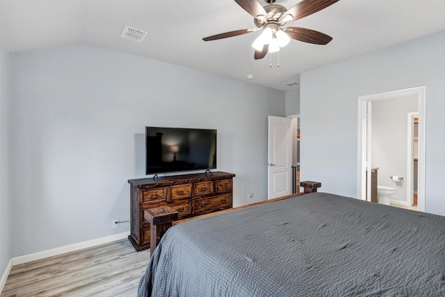 bedroom with visible vents, light wood-style flooring, a ceiling fan, and baseboards