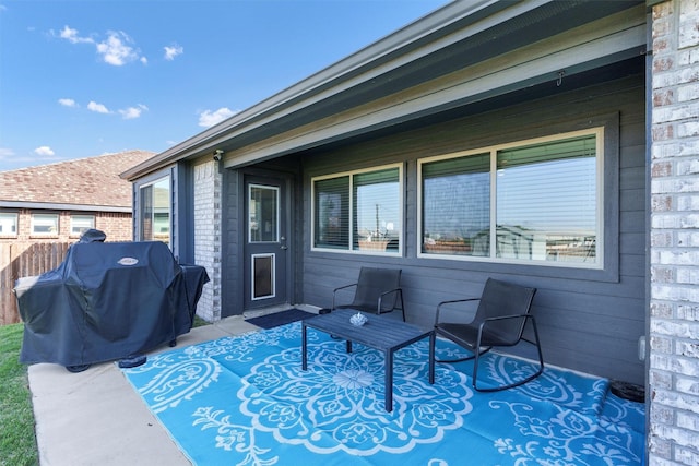 exterior space featuring fence and area for grilling