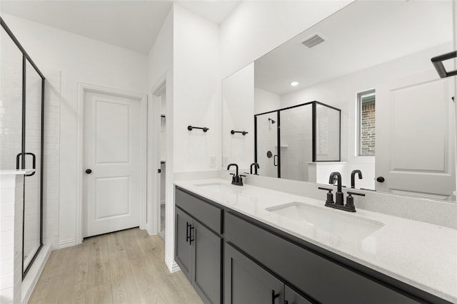 1905 Bobbin Ml, Forney, TX 75126 - full bath with wood finished floors, a stall shower, and double vanity