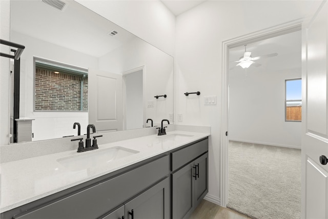 1905 Bobbin Ml, Forney, TX 75126 - bathroom with ceiling fan, double vanity, and baseboards
