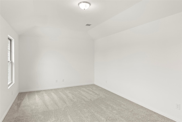 1905 Bobbin Ml, Forney, TX 75126 - spare room with carpet floors, baseboards, and vaulted ceiling