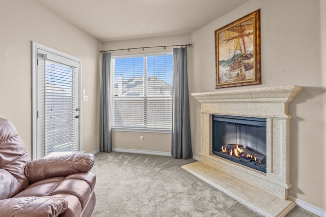 1321 Spanish Needle Trl, Fort Worth, TX 76177 - carpeted living area with a premium fireplace and baseboards