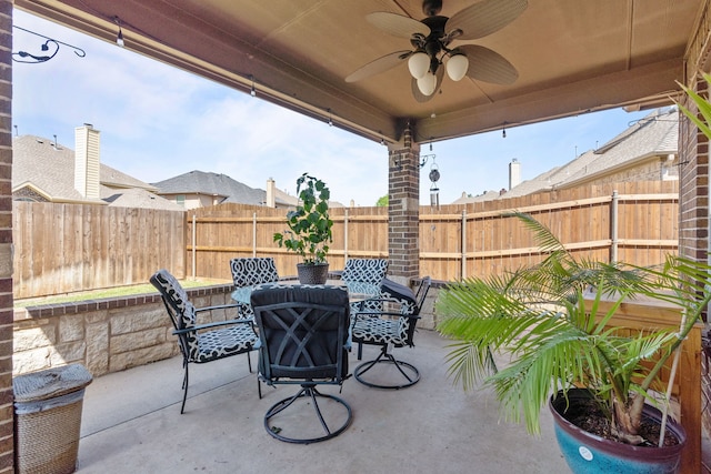 1321 Spanish Needle Trl, Fort Worth, TX 76177 - view of patio / terrace featuring outdoor dining space, a fenced backyard, and a ceiling fan