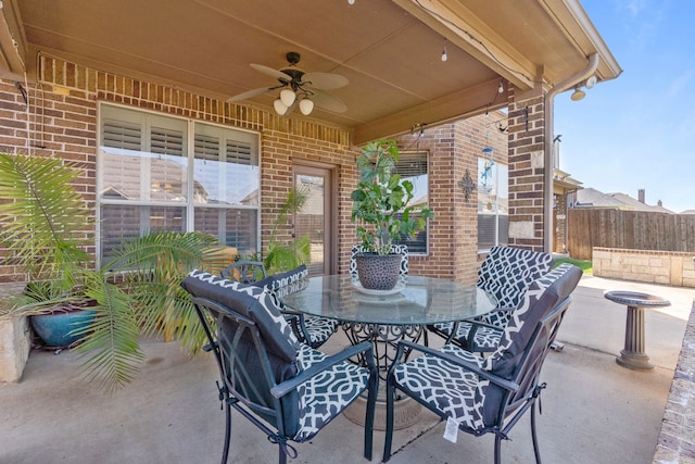 1321 Spanish Needle Trl, Fort Worth, TX 76177 - view of patio featuring outdoor dining space, fence, and ceiling fan