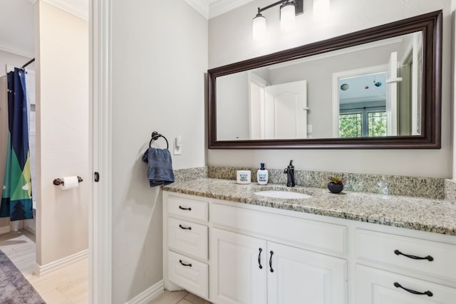 2413 Versailles Dr, Heath, TX 75032 - full bath with vanity, crown molding, baseboards, and curtained shower