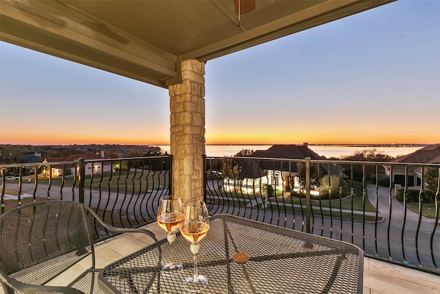 2413 Versailles Dr, Heath, TX 75032 - balcony at dusk featuring a water view