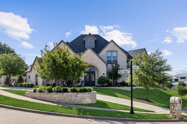 2413 Versailles Dr, Heath, TX 75032 - french country home featuring stone siding, french doors, and a front yard