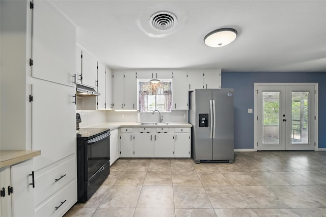 kitchen with a sink, light countertops, under cabinet range hood, black range with electric cooktop, and stainless steel fridge with ice dispenser