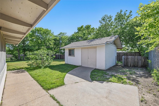 view of outbuilding featuring an outbuilding and a fenced backyard