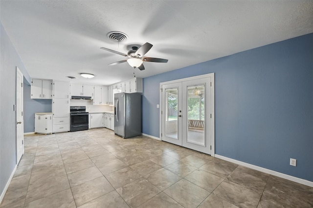 kitchen with stainless steel fridge, electric range, under cabinet range hood, ceiling fan, and french doors