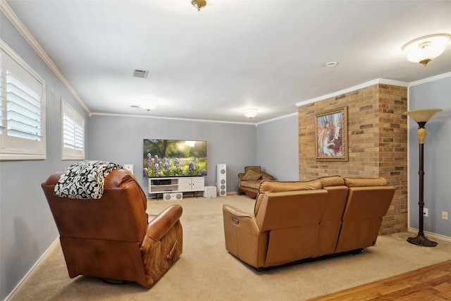 2833 S Country Club Rd, Garland, TX 75043 - carpeted living room featuring wood finished floors, baseboards, ornamental molding, and visible vents