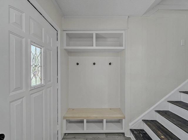 mudroom with wood finished floors