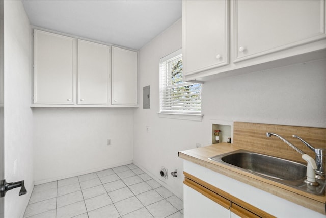 washroom featuring gas dryer hookup, a sink, and washer hookup
