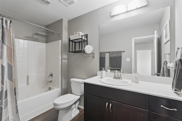 5540 Mcclelland St, Forney, TX 75126 - full bath with wood finished floors, vanity, toilet, and shower / bath combo with shower curtain