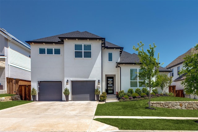 2313 Sandlin Dr, Fort Worth, TX 76008 - view of front of property with concrete driveway, stucco siding, an attached garage, a front yard, and fence