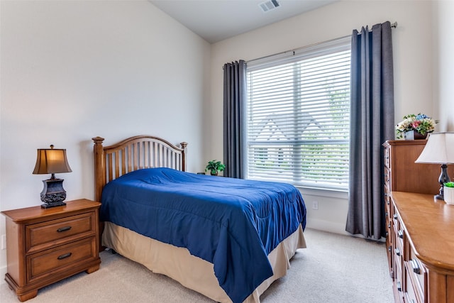 2313 Sandlin Dr, Fort Worth, TX 76008 - bedroom featuring visible vents, multiple windows, and light carpet