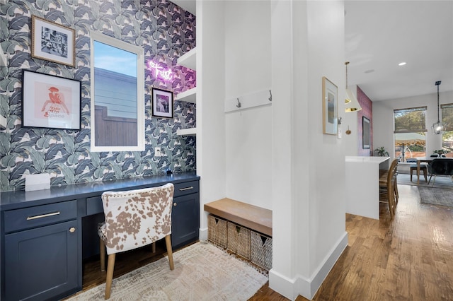 office space with baseboards, light wood-type flooring, recessed lighting, and wallpapered walls