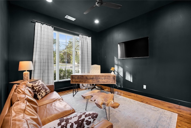 office space with wood finished floors, baseboards, a ceiling fan, and recessed lighting