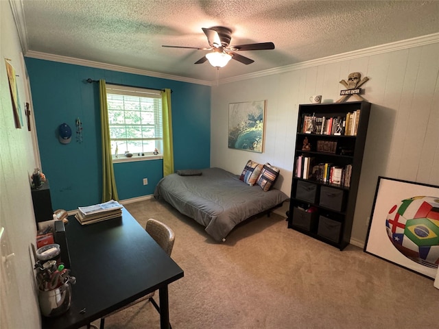 carpeted bedroom featuring crown molding, ceiling fan, and a textured ceiling