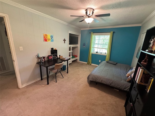 bedroom featuring light carpet, ceiling fan, crown molding, and a textured ceiling