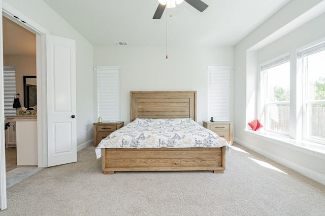 bedroom with light carpet, baseboards, a ceiling fan, and visible vents