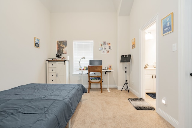 carpeted bedroom featuring baseboards