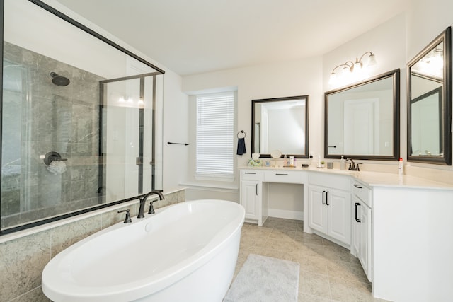 full bathroom with tile patterned floors, a shower stall, a soaking tub, and double vanity