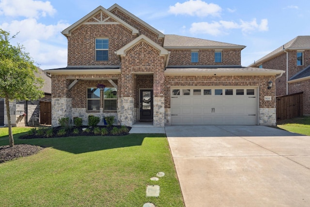 craftsman house with stone siding, driveway, a front lawn, and a garage