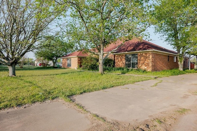275 Salesville Rd, Mineral Wells, TX 76067 - view of property exterior featuring a lawn