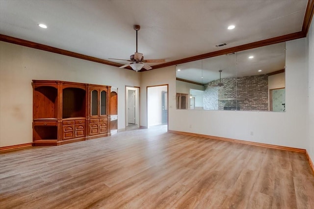 275 Salesville Rd, Mineral Wells, TX 76067 - unfurnished living room with baseboards, wood finished floors, ornamental molding, and ceiling fan