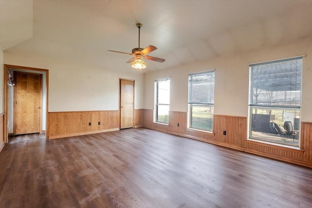 275 Salesville Rd, Mineral Wells, TX 76067 - empty room featuring wainscoting, a ceiling fan, wood finished floors, and lofted ceiling