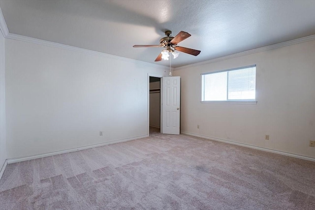 275 Salesville Rd, Mineral Wells, TX 76067 - unfurnished bedroom featuring a ceiling fan, light carpet, crown molding, and baseboards