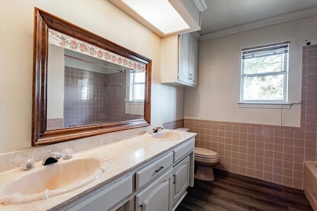 275 Salesville Rd, Mineral Wells, TX 76067 - full bath featuring tile walls, a sink, double vanity, and toilet